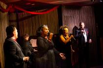 Singers, from left, Randal Keith, Amanda King, Michelle Johnson and Sam Holder perform along wi ...