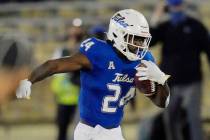 Tulsa running back Corey Taylor II (24) carries during an NCAA college football game against Tu ...