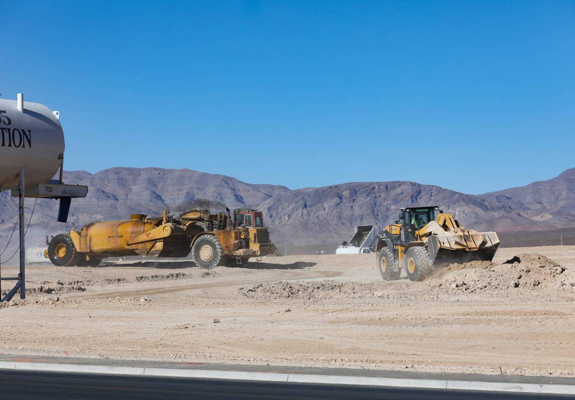 Construction on the future site of an Amazon facility across from the Amazon LAS7 Fulfillment C ...