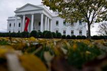 A ribbon hangs on the White House for World AIDS Day 2020, Tuesday, Dec. 1, 2020, in Washington ...