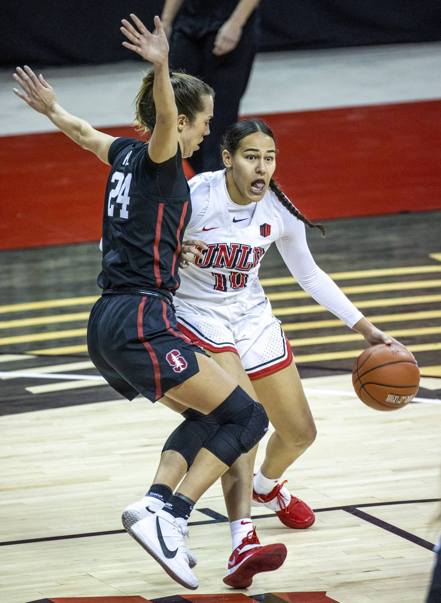 UNLV Lady Rebels guard Jacinta Buckley (10, right) looks to drive on Stanford Cardinal guard La ...