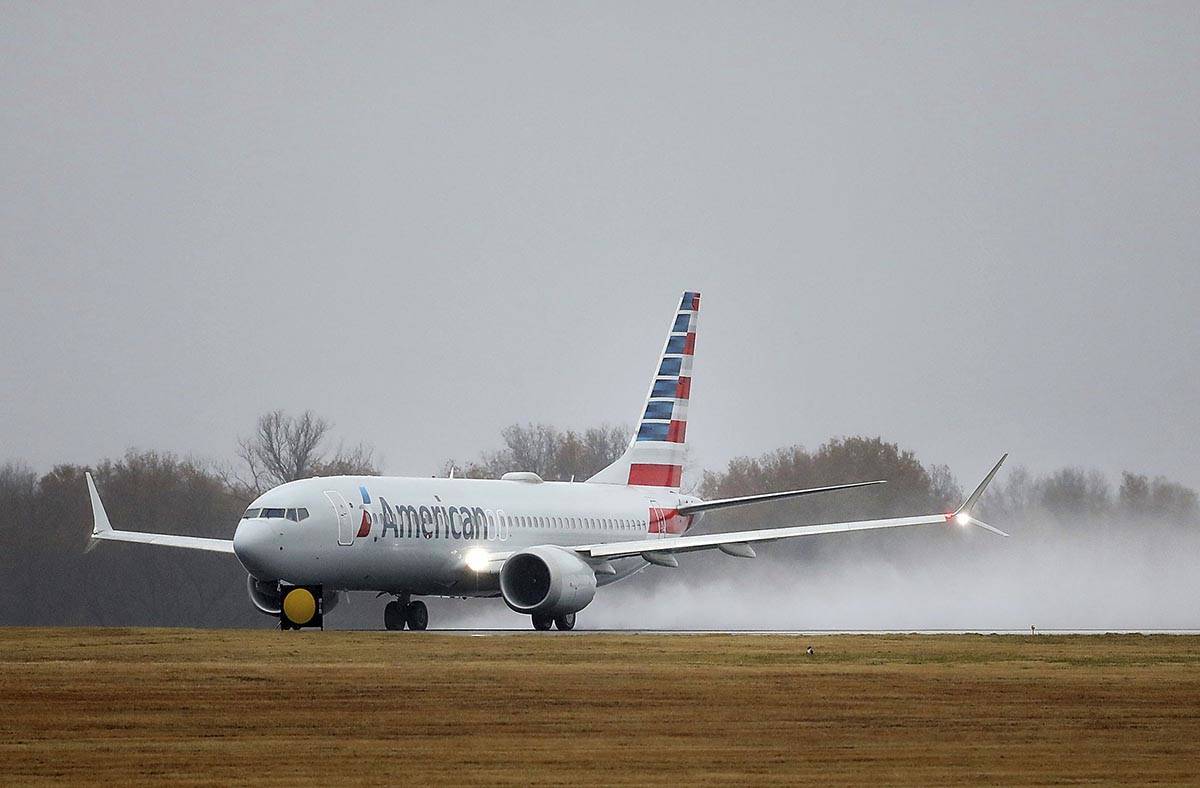 An American Airlines Boeing 737 Max takes off at Tulsa International Airport to fly to Dallas W ...