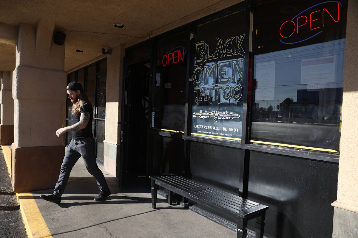 Caleb Cashew, owner of Black Omen Tattoo, is raffling off his business and inventory to one luc ...
