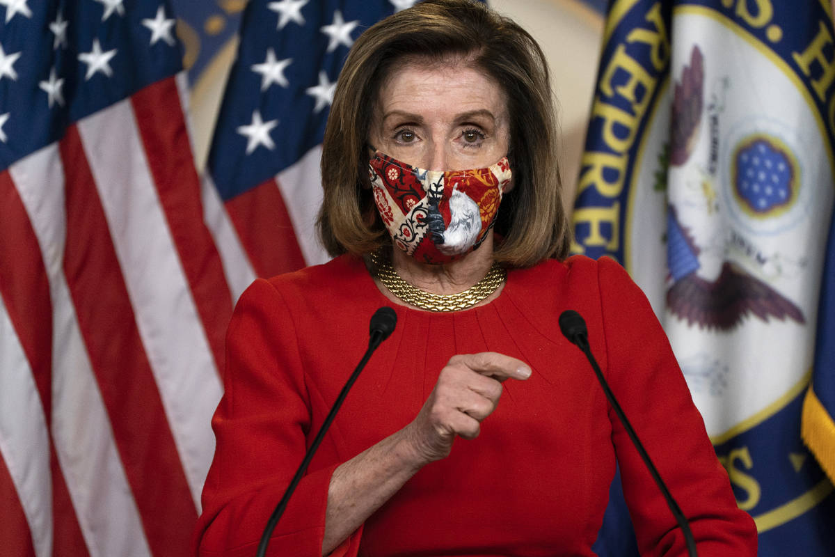 House Speaker Nancy Pelosi, of Calif., speaks during her weekly briefing, Friday, Dec. 4, 2020, ...