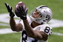 Las Vegas Raiders tight end Darren Waller (83) warms up before the start of an NFL football gam ...
