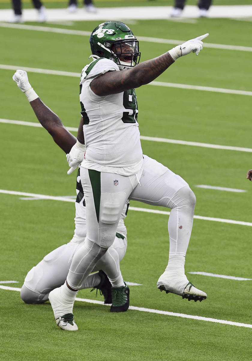 New York Jets defensive lineman Quinnen Williams (95) reacts after making a tackle during an NF ...
