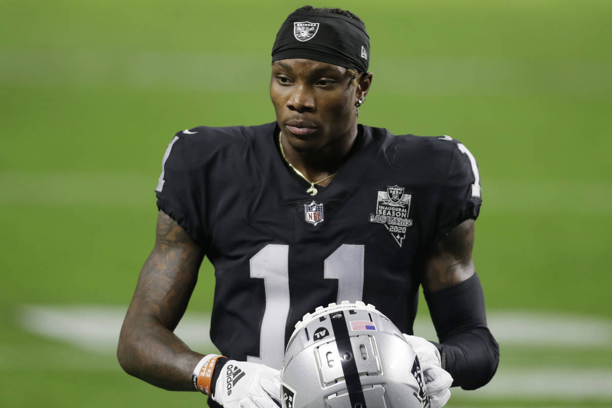 Las Vegas Raiders wide receiver Henry Ruggs III (11) warms up before an NFL football game again ...