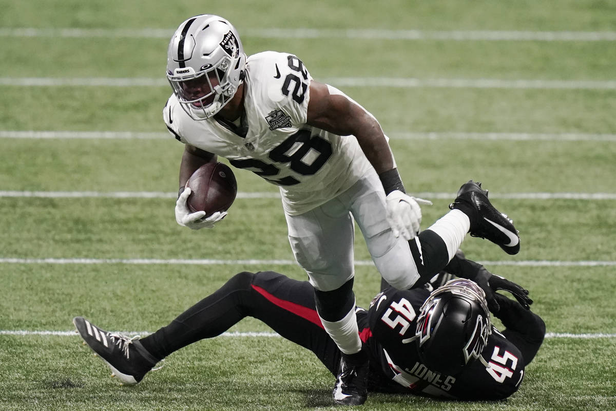 Atlanta Falcons linebacker Deion Jones (45) tackles Las Vegas Raiders running back Josh Jacobs ...