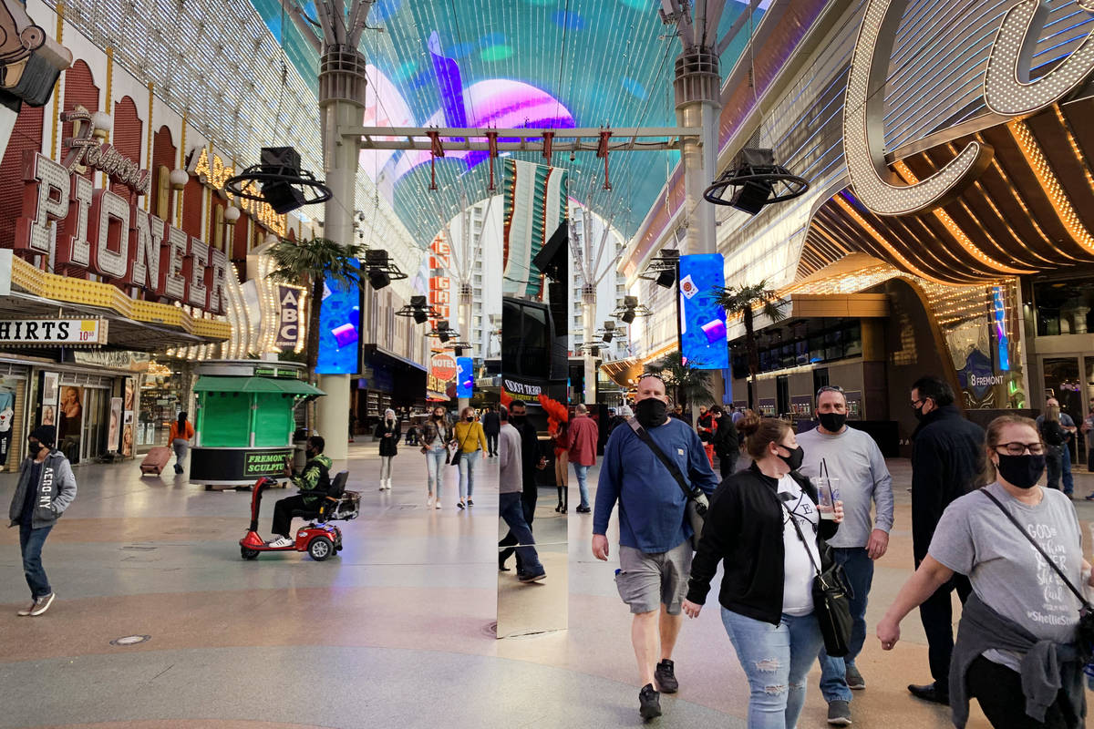 A 10-foot monolith stands under the Fremont Street Canopy in Las Vegas Friday, Dec. 4, 2020. (E ...