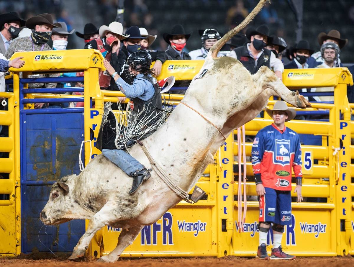 Colten Fritzlan rides during the 3rd go-round of the National Finals Rodeo in Arlington, Texas, ...