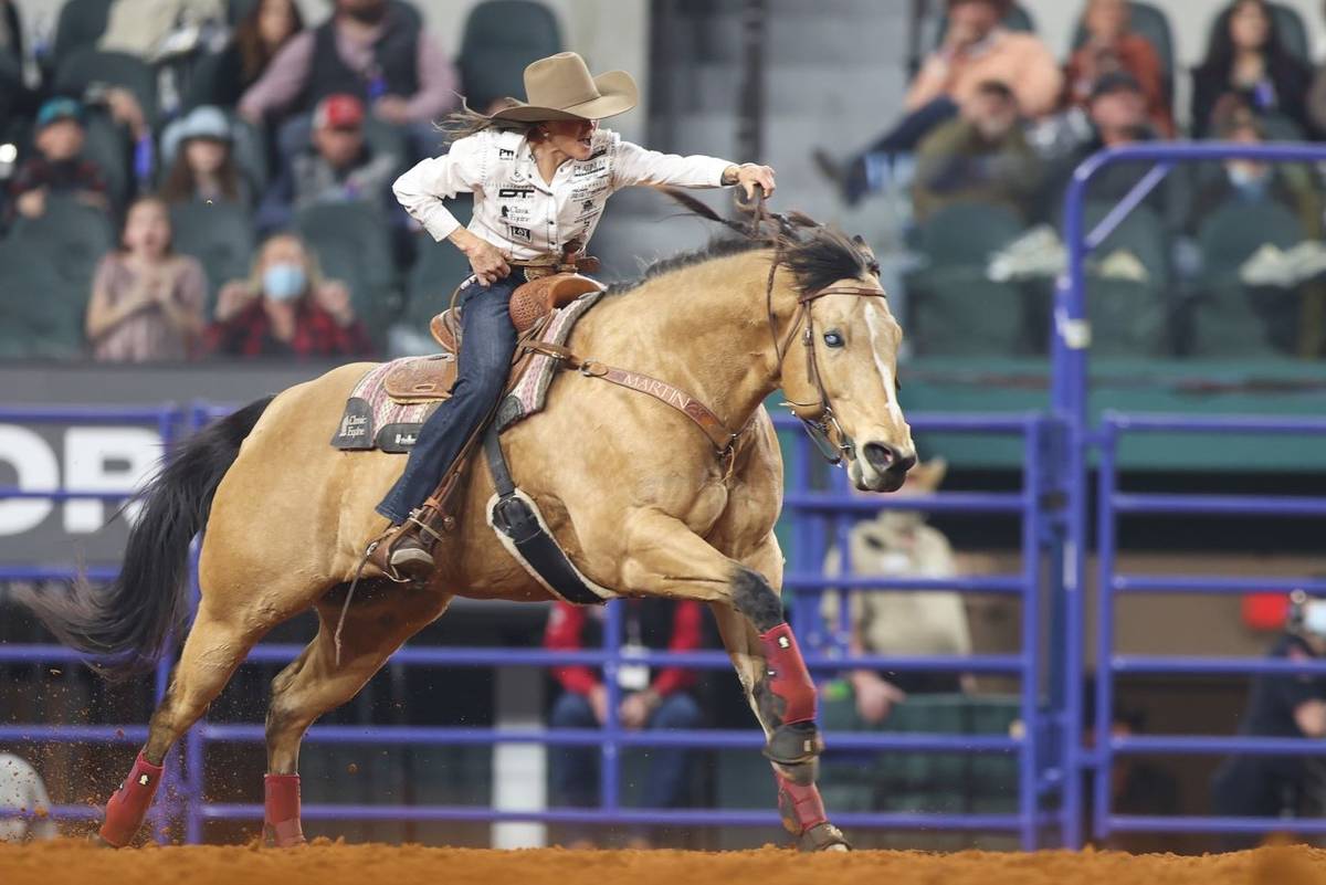 Lisa Lockhart performs during the 3rd go-round of the National Finals Rodeo in Arlington, Texas ...
