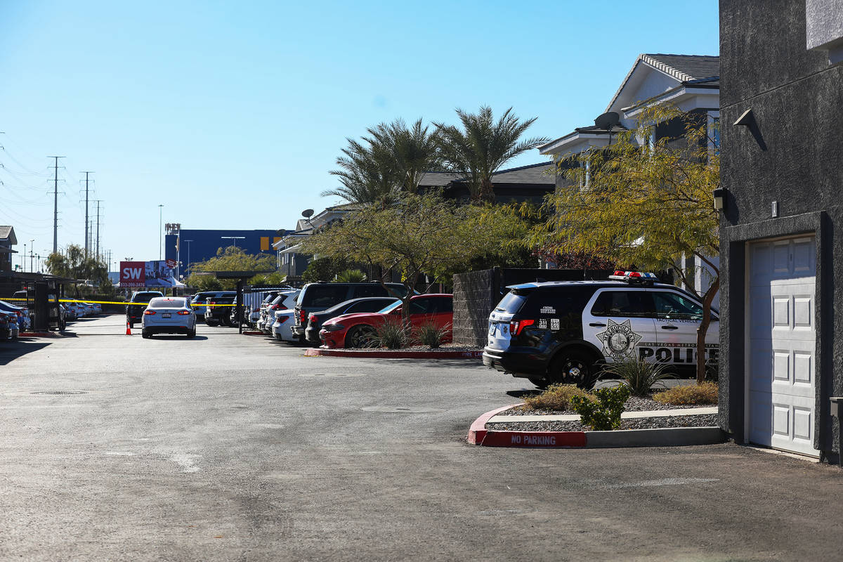 Police on the scene at an apartment complex where a man was shot and killed in the southwest La ...