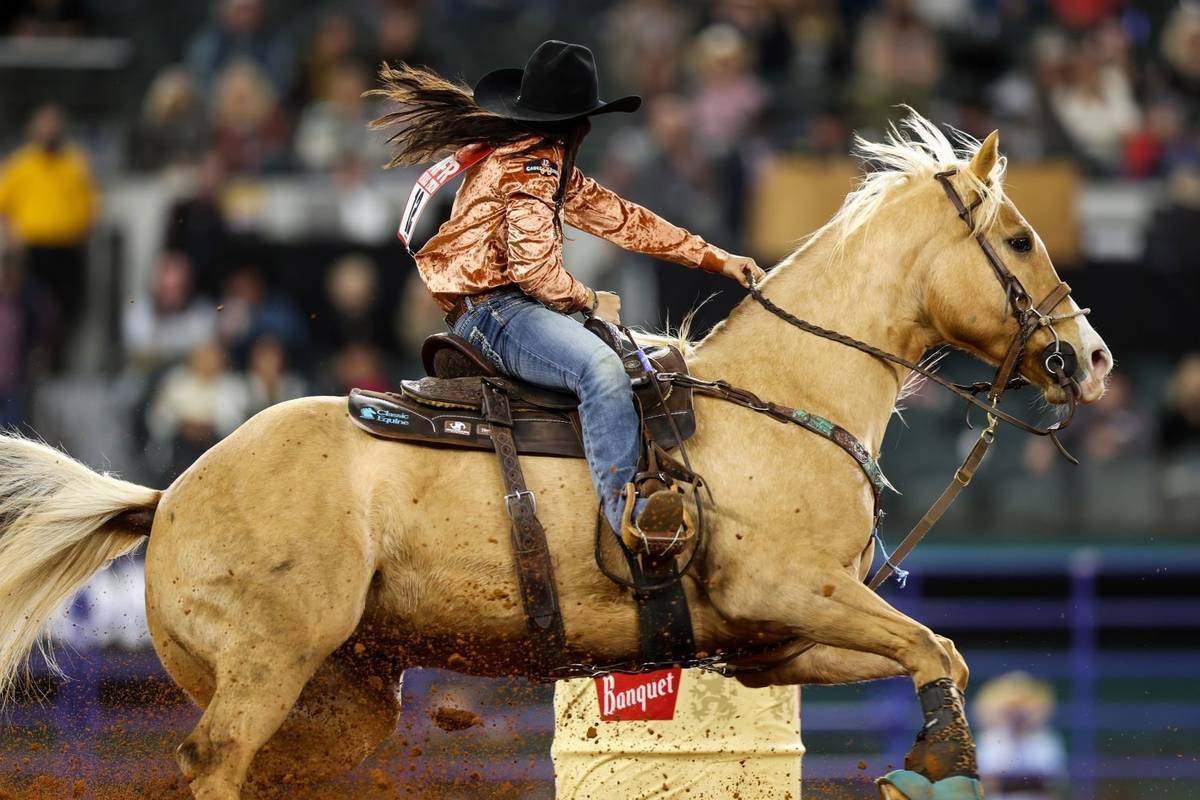 Hailey Kinsel rides during the 4th go-round of the National Finals Rodeo in Arlington, Texas, o ...