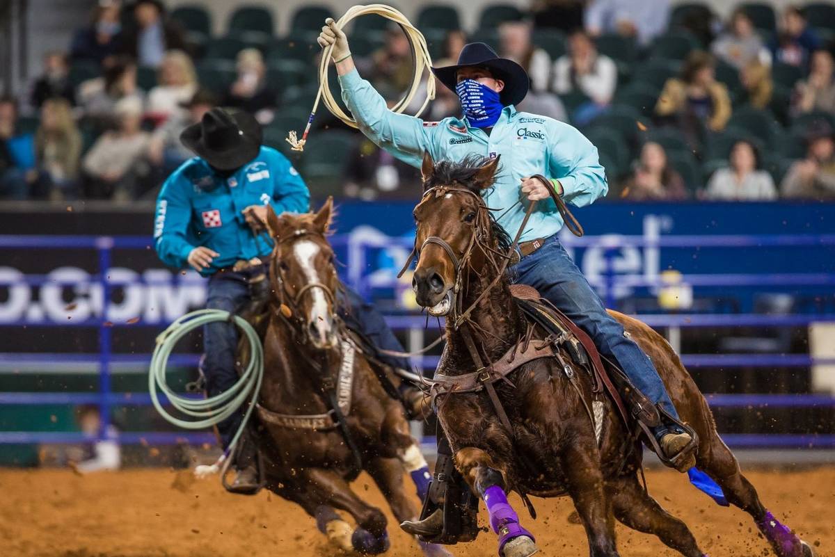 Brenten Hall performs during the 4th go-round of the National Finals Rodeo in Arlington, Texas, ...