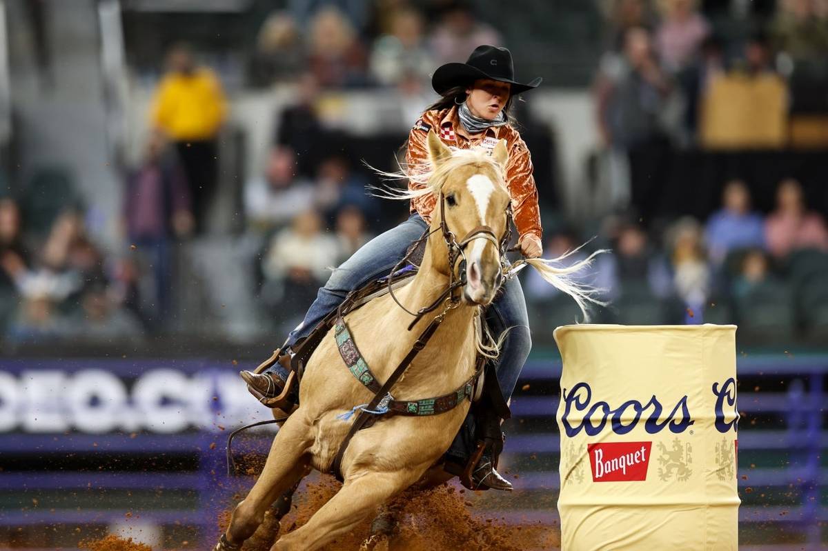 Hailey Kinsel performs during the 4th go-round of the National Finals Rodeo in Arlington, Texas ...
