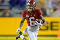 Alabama wide receiver DeVonta Smith (6) runs for gain during an NCAA college football game agai ...