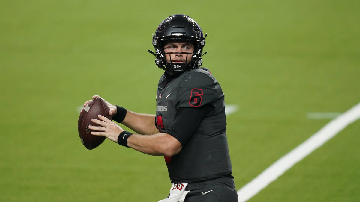 UNLV quarterback Max Gilliam (6) plays against Nevada during the second half of an NCAA college ...