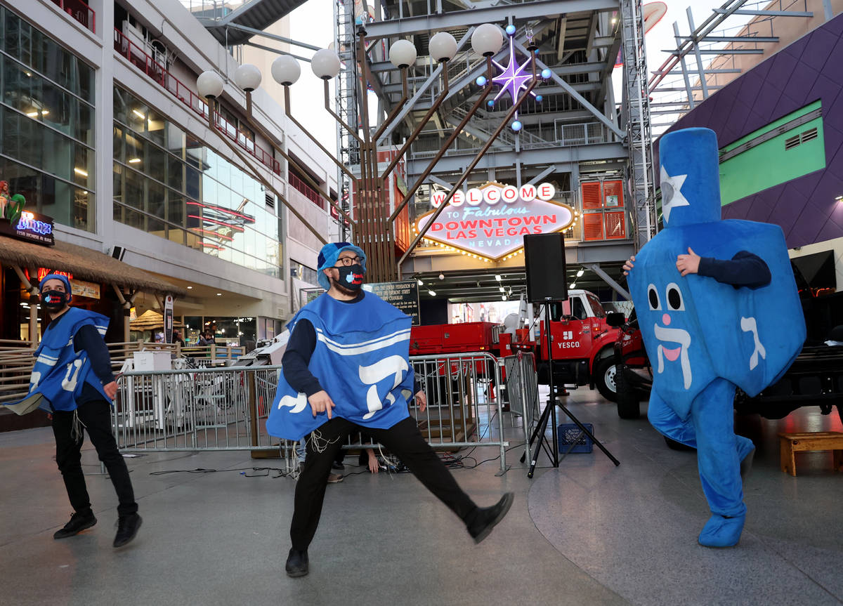 Members of the Dancing Dreidels, from left, Shaul Rimler of Phoenix, Lev Voskoboynik of Las Veg ...