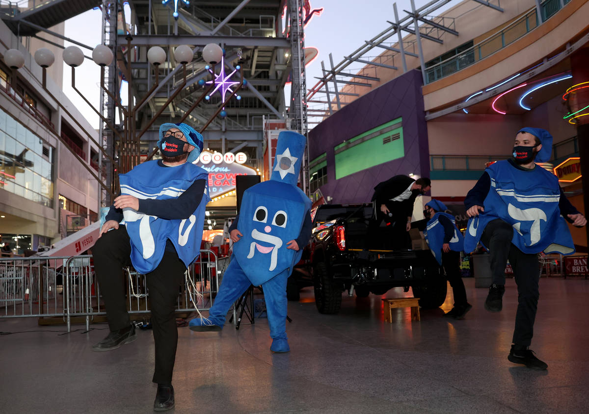 Members of the Dancing Dreidels, from left, Lev Voskoboynik of Las Vegas, Shmulie Cunin of Las ...