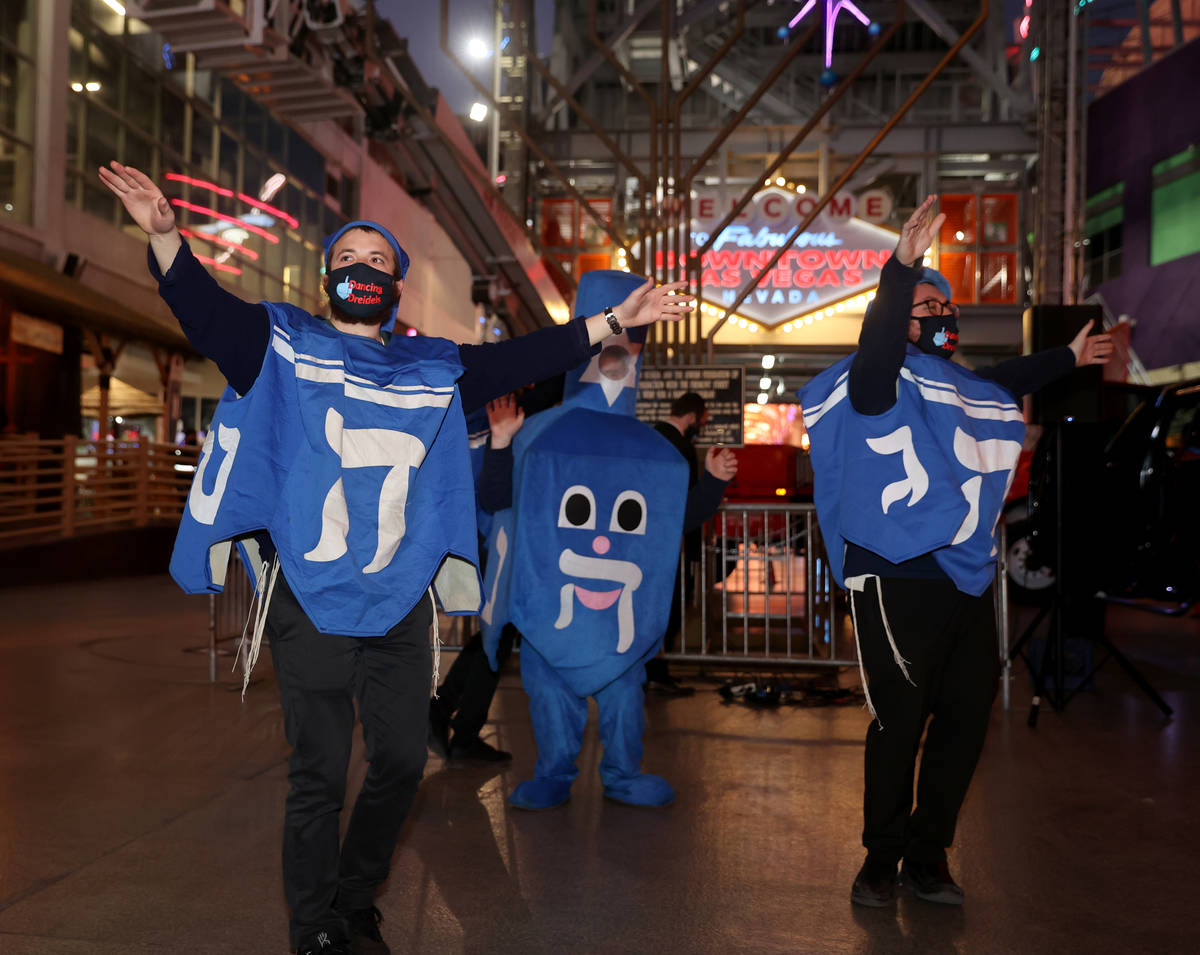 Members of the Dancing Dreidels, from left, Mendy Piekarski of Miami, left, Shmulie Cunin of La ...