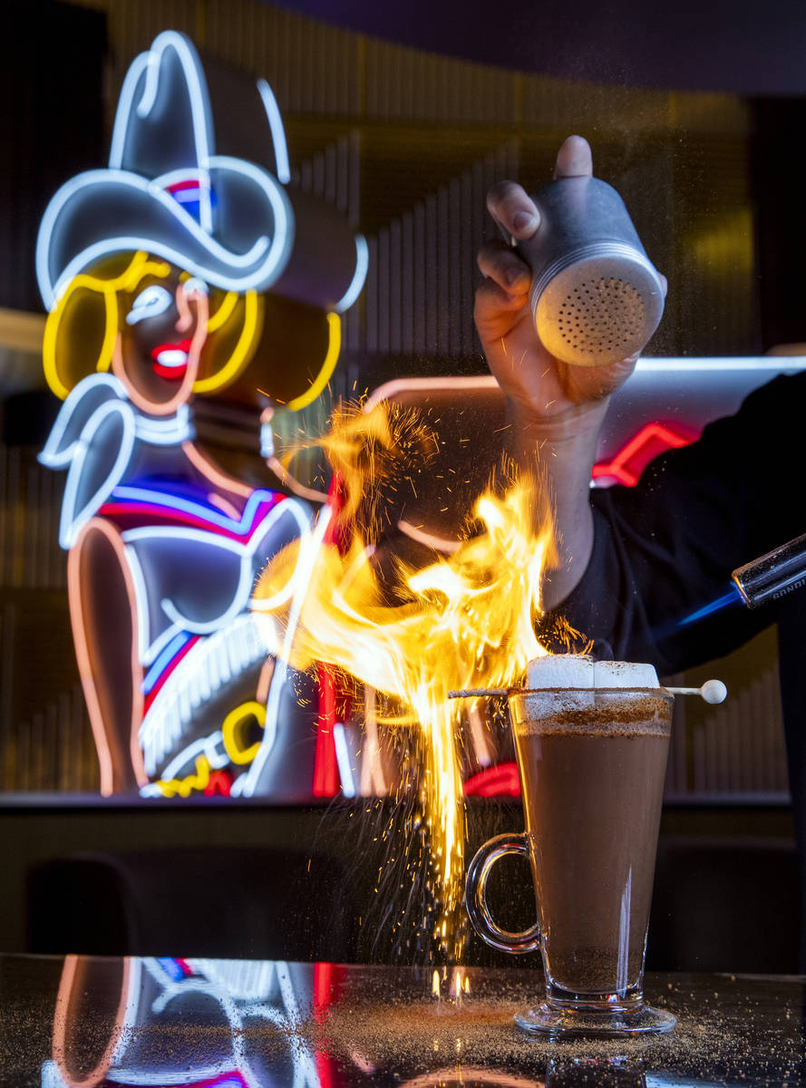 Bartender Anthony Wu prepares a Campfire Hot Chocolate at Vegas Vickie's Cocktail Lounge in the ...