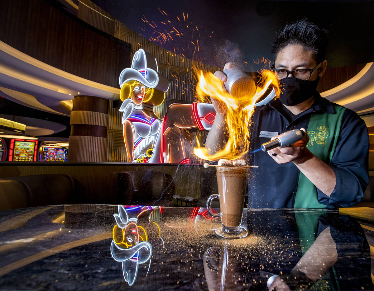 Bartender Anthony Wu prepares a Campfire Hot Chocolate at Vegas Vickie's Cocktail Lounge at Cir ...