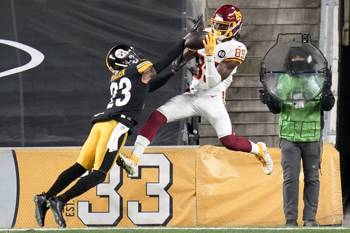 Pittsburgh Steelers cornerback Joe Haden (23) breaks up a pass intended for Washington Football ...
