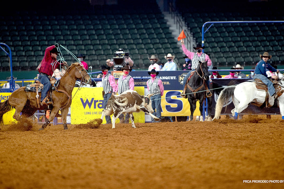 Clay Smith and Jade Corkill perform during the fifth go-round of the National Finals Rodeo in A ...