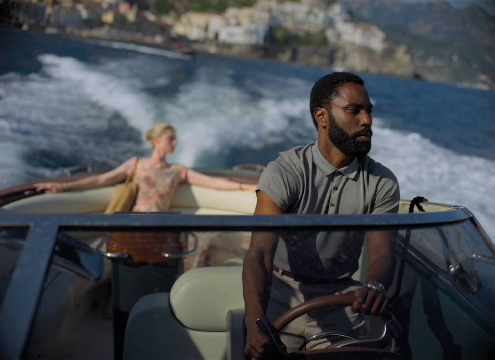 Elizabeth Debicki and John David Washington star in "Tenet." (Warner Bros. Pictures)