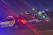 A white pickup was flipped in a collision at South Durango Drive and the 215 Beltway on Tuesday ...