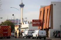 Las Vegas firefighters respond to the scene of a fire at the Alpine Motel Apartments on Dec. 21 ...
