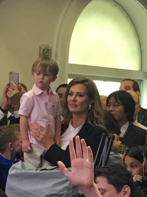 Newsmax White House Correspondent Emerald Robinson with her son Asher at a White House press br ...