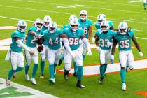 Miami Dolphins cornerback Xavien Howard (25) celebrates intercepting a pass intended for Cincin ...