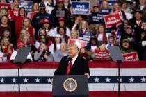 President Donald Trump addresses the crowd at a rally for U.S. Senators Kelly Loeffler, R-Ga., ...