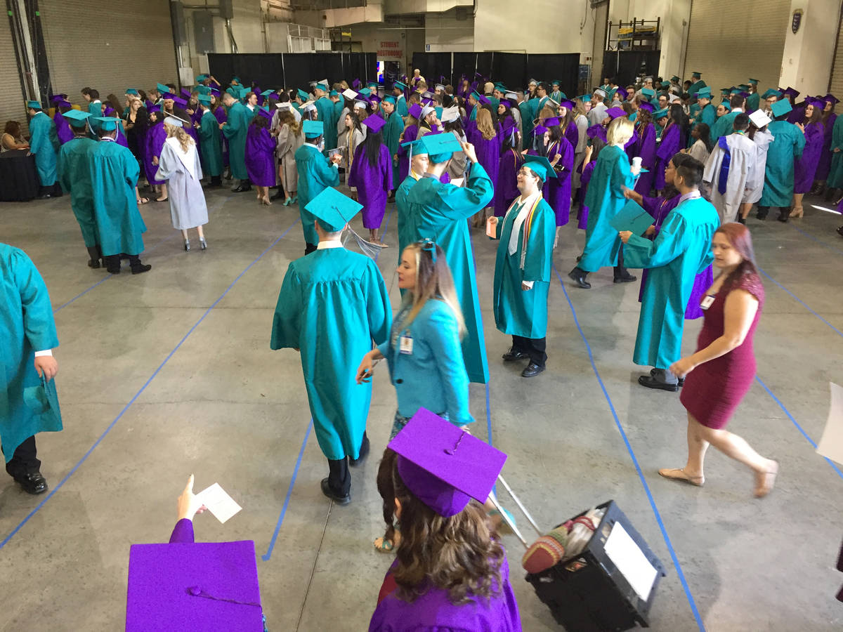 Silverado High School students congregate in a back room at Orleans Arena before graduation in ...