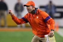 Clemson coach Dabo Swinney yells during the first half of the team's Fiesta Bowl NCAA college f ...