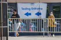 People enter the walk-up COVID-19 testing offered at Cashman Center in partnership with Univers ...