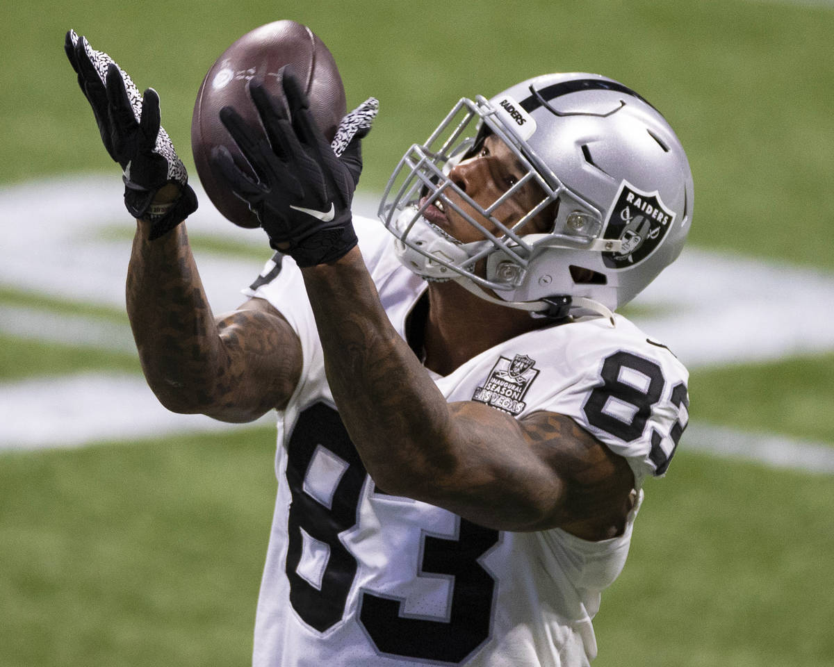 Las Vegas Raiders tight end Darren Waller (83) warms up before the start of an NFL football gam ...