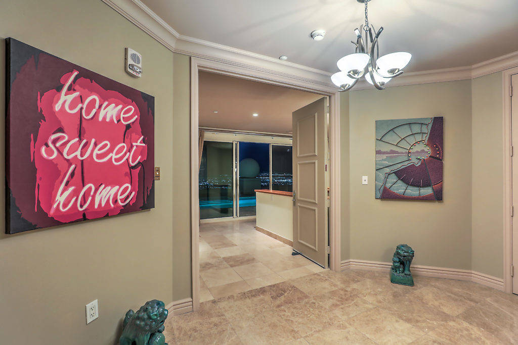 The upstairs entertainment level, which measures nearly 3,000 square feet, features a spacious ...