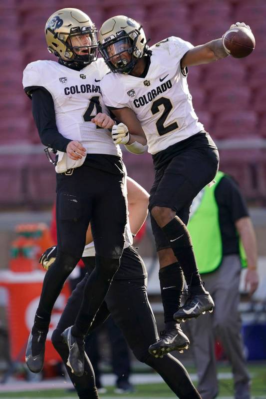 FILE - In this Saturday, Nov. 14, 2020, file photo, Colorado quarterback Sam Noyer (4) and wide ...