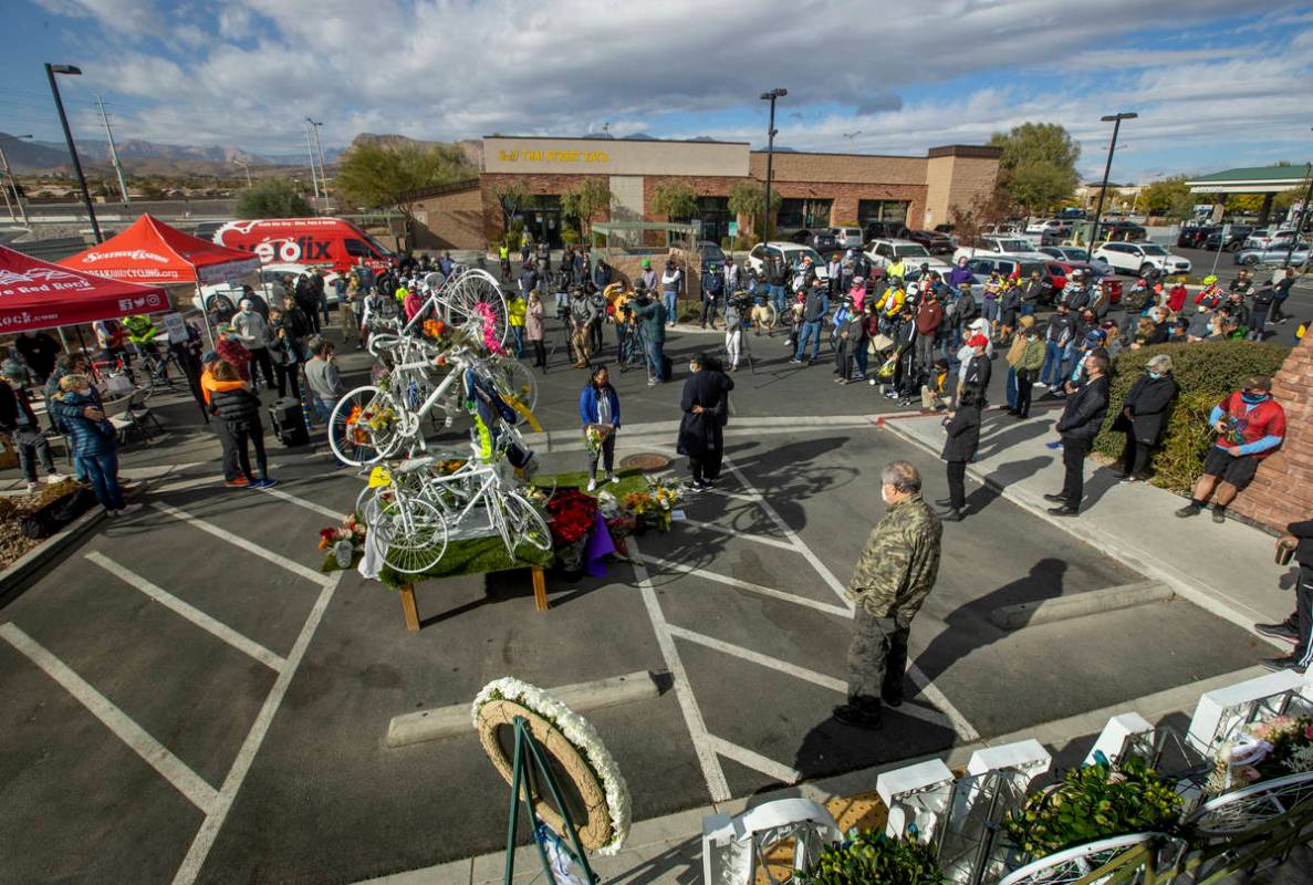 Inspirational words are spoken during a vigil honoring the lives of five Las Vegas cyclists who ...