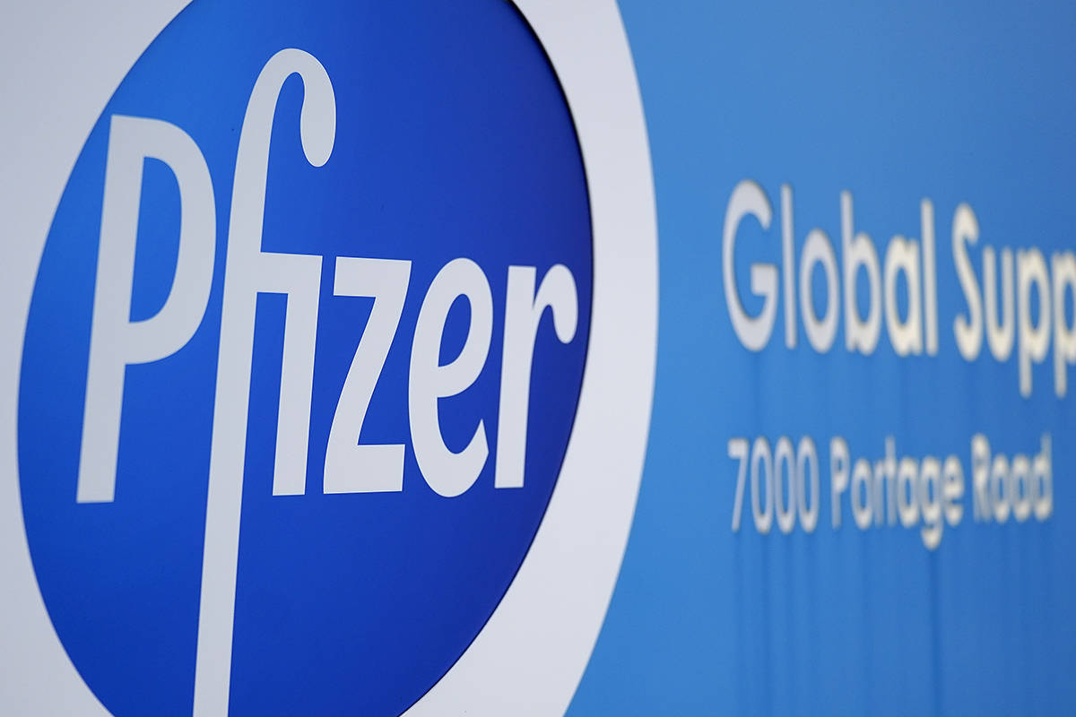 A Pfizer Global Supply Kalamazoo manufacturing plant sign is shown in Portage, Mich., Friday, D ...