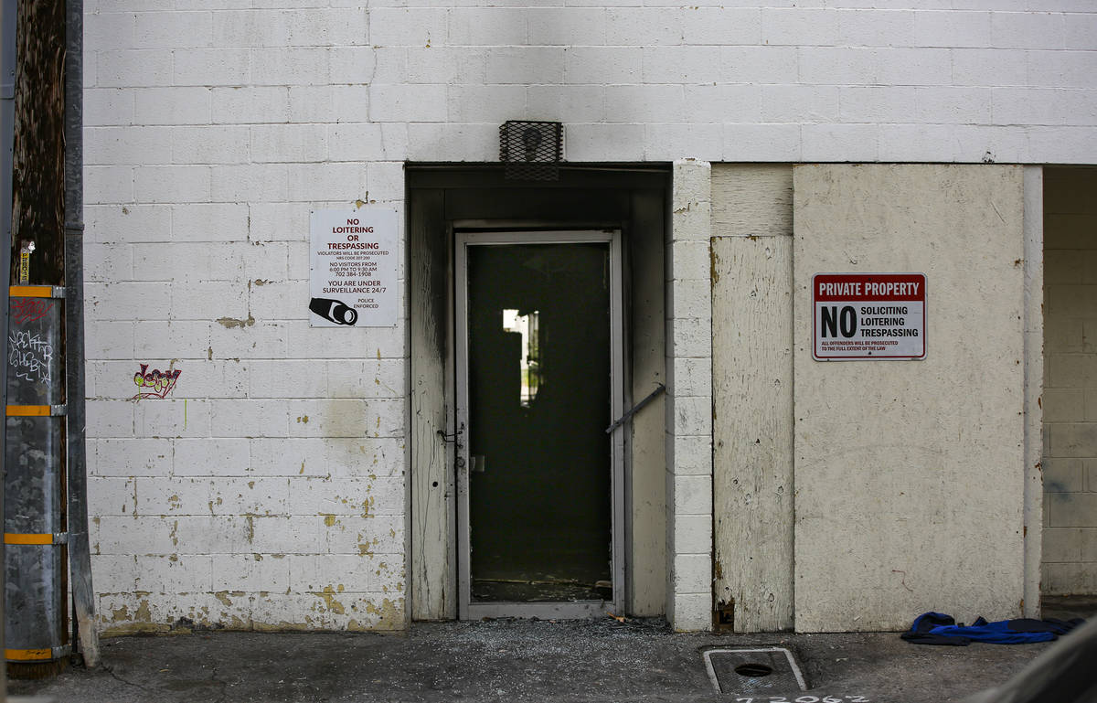 The back entrance to the Alpine Apartment Motel after a fire left 6 dead in Las Vegas on Saturd ...