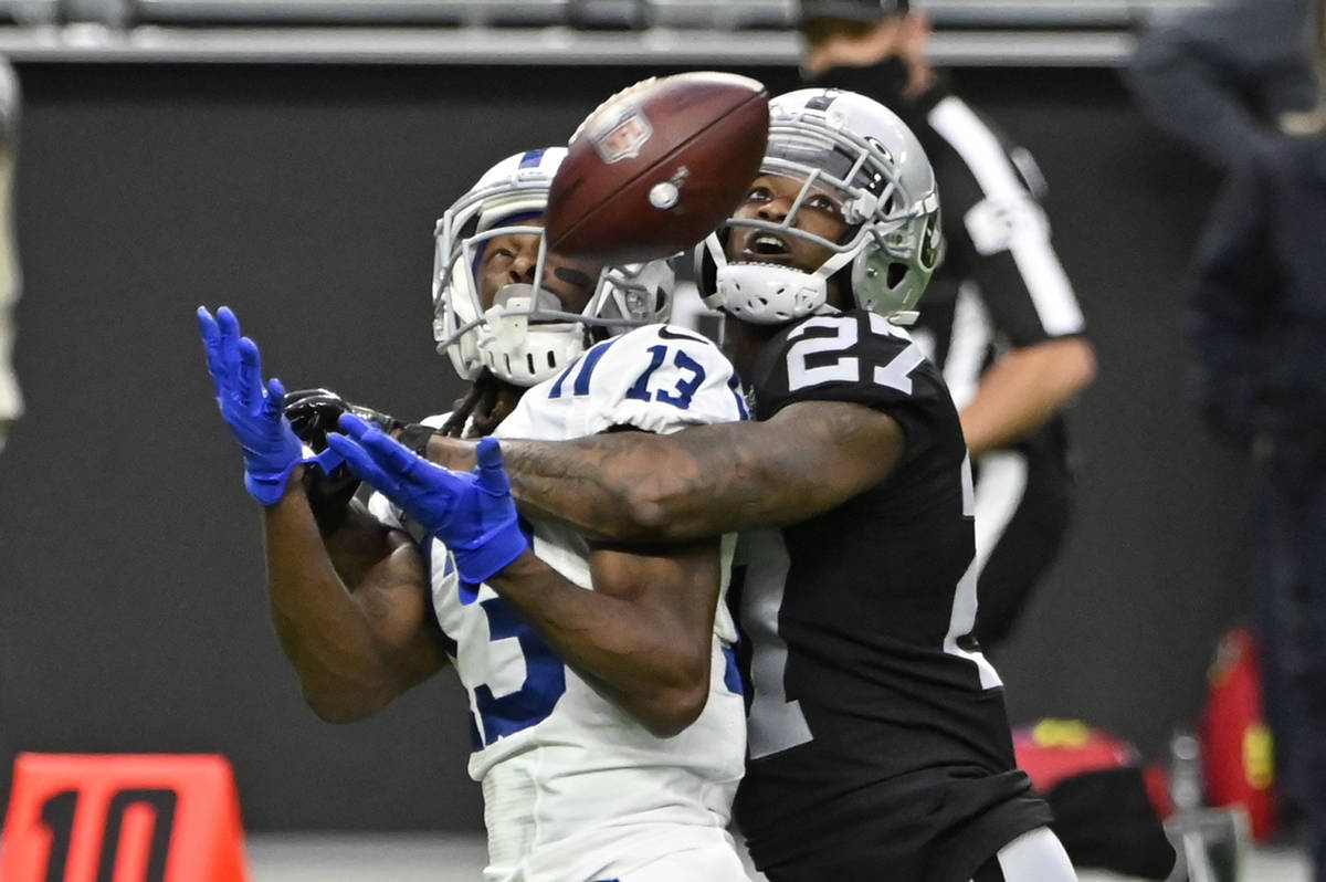 Indianapolis Colts wide receiver T.Y. Hilton (13) misses a catch while covered by Las Vegas Rai ...