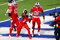 Buffalo Bills wide receiver Stefon Diggs (14) celebrates after scoring on an 18-yard pass play ...