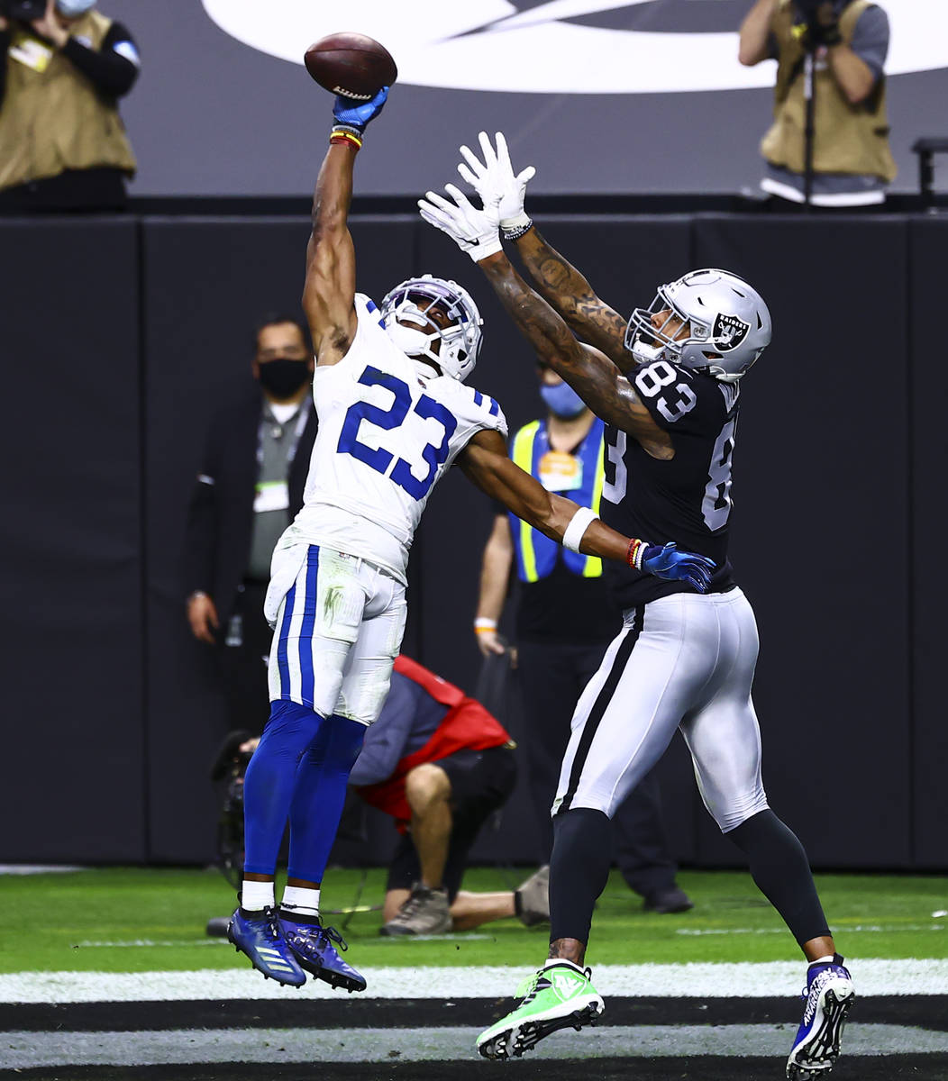 Indianapolis Colts cornerback Kenny Moore II (23) intercepts a pass intended for Raiders tight ...