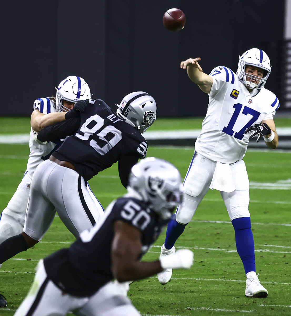 Indianapolis Colts quarterback Philip Rivers (17) throws a pass while playing the Raiders in th ...
