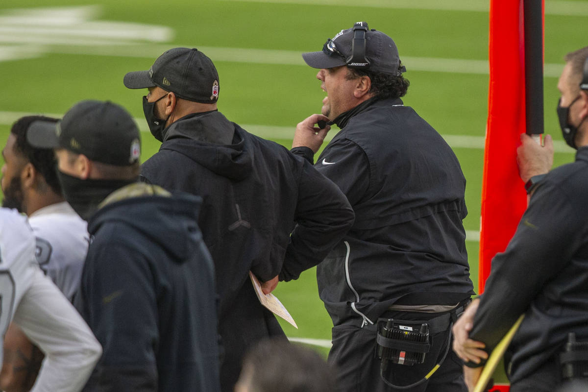 Las Vegas Raiders defensive coordinator Paul Guenther coaches from the sideline during the firs ...