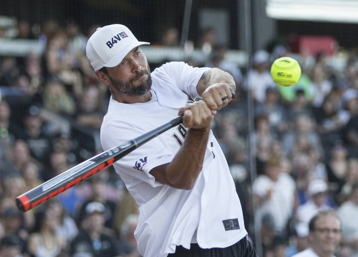 Golden Knights defenseman Deryk Engelland takes a swing during the home run derby at the Battle ...