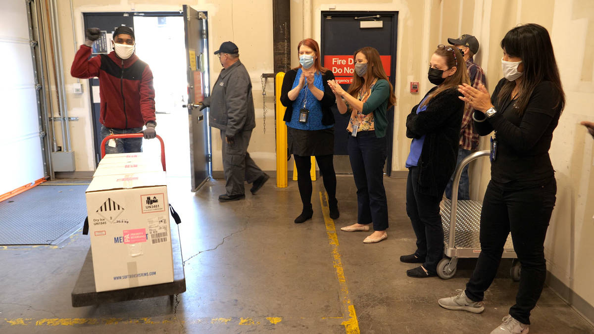 The first doses of COVID-19 vaccine arrive at the Southern Nevada Health District on Monday, De ...